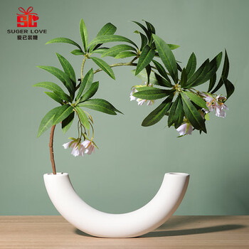Love has been filled with sugar embryos, curved bows, simple ceramic vases, simulated water stone banyan sets, fake flowers, living room decorations, table flowers, birthday gifts