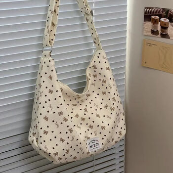 Dinaqi floral shoulder bag women's crossbody bag 2025 autumn new underarm large capacity korean commuting tote dinaqi white school bag with cat pendant