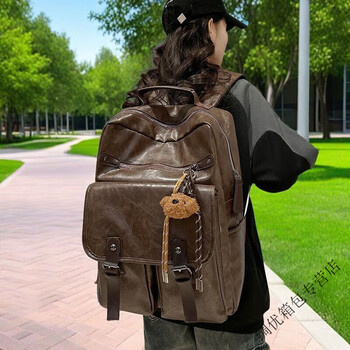 Ye yusen's large-capacity leather backpack for outings, versatile men's and women's computer backpacks, fashionable college school bags, jy high-looking 5617-brown with pendant