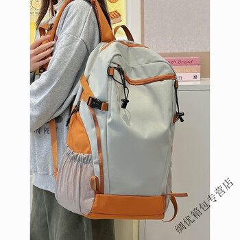 Ye yu durable outdoor backpack women's light backpack waterproof travel bag male college student hiking and traveling mountaineering bag orange school bag + gray frog pendant