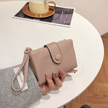 Woodpecker (tucano) european and american fashionable women's short wallet 2026 new texture multi-card slot folding wallet portable zipper clutch pink