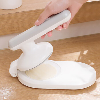 Yong huan's tool for pressing dumpling skins, new household bun mold, dumpling rolling dough, lazy man's manual skin press, white