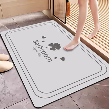 Fantasy soft diatom mud bathroom bathroom entrance absorbent floor mat household non-slip foot mat toilet bathroom bathroom carpet thickened water-absorbent and quick-drying four-leaf clover distant mountain gray 45cmx70cm thickened rubber non-slip
