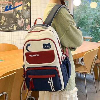 Warrior schoolbag female junior high school student good-looking large-capacity elementary school girl backpack third to sixth grade weight-reducing lightweight backpack dark blue