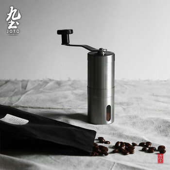 Jiutu hand-operated coffee bean grinder is portable, small and simple, ceramic grinding core, solid stainless steel and durable grinder