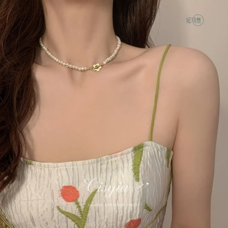 Ji Yuyou pearl necklace women's summer new light luxury high-end birthday gift niche millet grain necklace flower collarbone chain pearl necklace