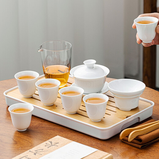 Gold inlaid jade travel tea set, mutton-fat jade porcelain household ceramic white porcelain with tea tray and bowl set, gift Kung Fu tea set, Leshui mutton-fat jade porcelain set