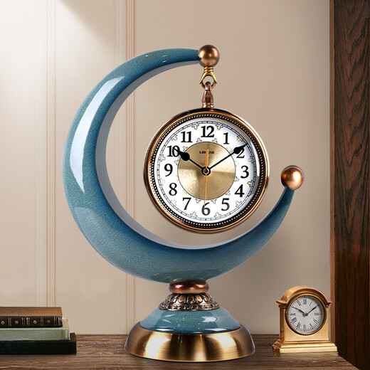 Twelve-eye European-style clock light luxury display clock living room sitting clock desktop pendulum clock table-style ornaments American home table clock blue gold pottery bottom