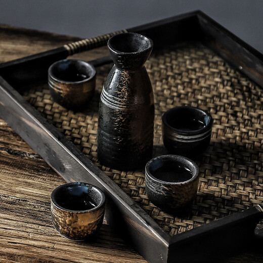 Porcelain in the Four Directions Japanese retro old tavern sake set home wine pot soju cup restaurant small wine glass liquor dispenser Japanese and Korean restaurant specialty wine set Hengdian pose Chinese style trumpet sake set one pot and two cups