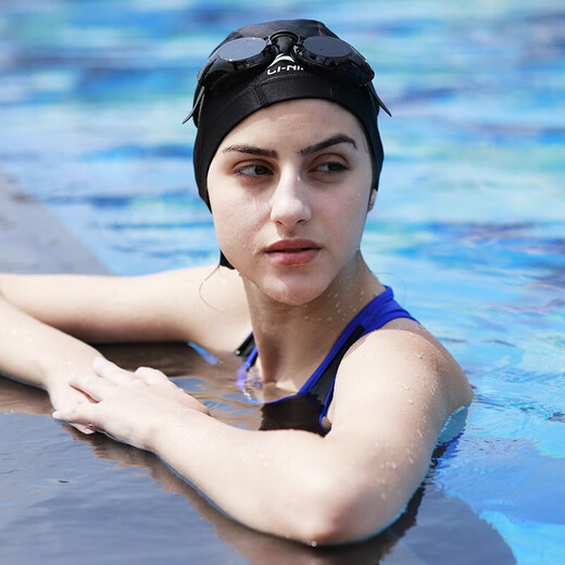 Li Ning (LI-NING) swimming cap, waterproof ear protection, comfortable long hair silicone swimming cap for men and women, adult professional training silicone swimming cap, cloth cap black