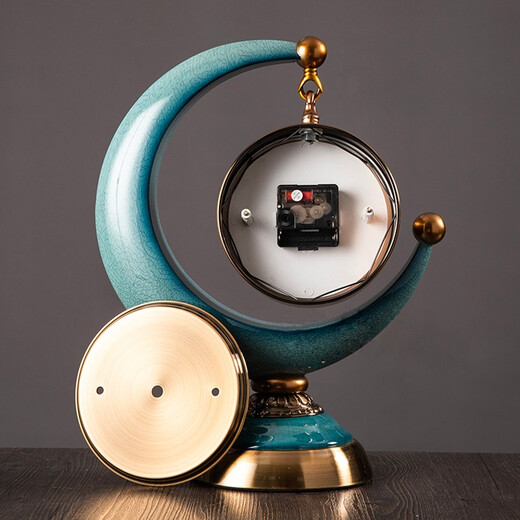 Twelve-eye European-style clock light luxury display clock living room sitting clock desktop pendulum clock table-style ornaments American home table clock blue gold pottery bottom