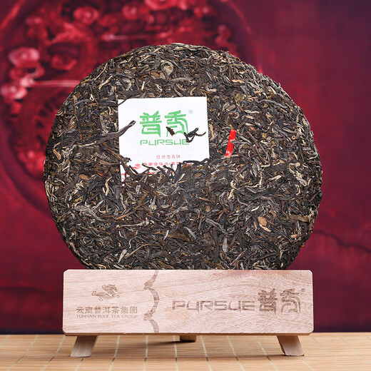 Puxiu brand Pu'er tea 2012 Puxiu red ribbon green cake Qizi cake raw tea ten years old tea floral fragrance Yunnan dry warehouse 2012 357g