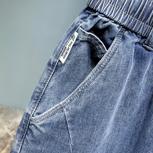 
2025 spring and summer thin elastic waistless jeans men's lace-up simple loose large size casual elastic harem pants light blue 675 thin model 32 (recommended 135-145Jin [Jin equals 0.5 kg])