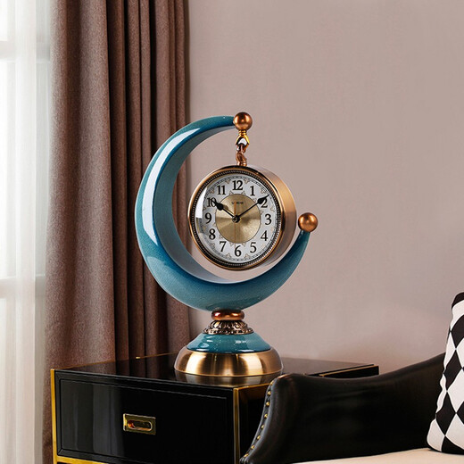 Twelve-eye European-style clock light luxury display clock living room sitting clock desktop pendulum clock table-style ornaments American home table clock blue gold pottery bottom