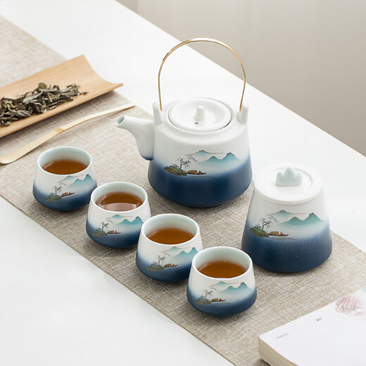 Gold inlaid jade Kung Fu tea set, a complete set of ceramic lifting kettles, tea cups, tea cans, Kung Fu tea sets, souvenirs, scenic blue and white lifting sets