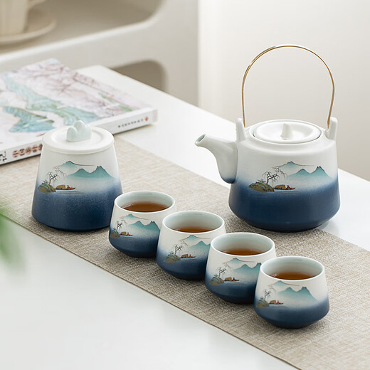 Gold inlaid jade Kung Fu tea set, a complete set of ceramic lifting kettles, tea cups, tea cans, Kung Fu tea sets, souvenirs, scenic blue and white lifting sets