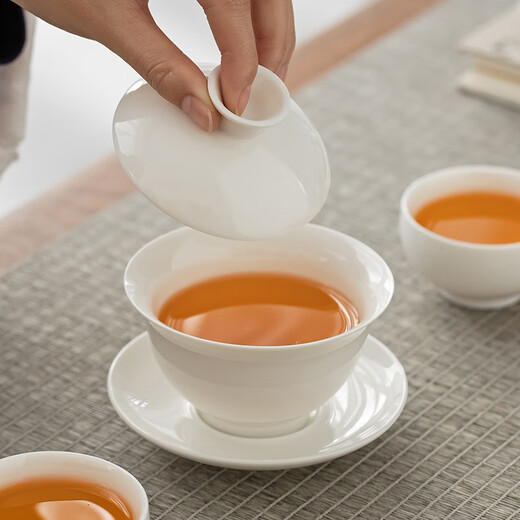 Gold inlaid jade tea set, ceramic kung fu teapot and cup, free gift box, high-end benefits, white porcelain simple clouds and water ballads