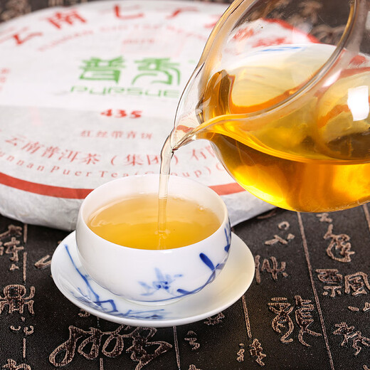 Puxiu brand Pu'er tea 2012 Puxiu red ribbon green cake Qizi cake raw tea ten years old tea floral fragrance Yunnan dry warehouse 2012 357g