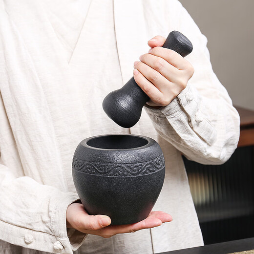 Natural black gold stone hand-carved old-fashioned stone mortar, garlic mortar, stone cup, garlic pounder, medicine jar, nest pounding bowl, pounder, black stone stone mortar outer diameter 13, carved vine flower