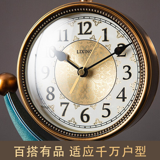 Twelve-eye European-style clock light luxury display clock living room sitting clock desktop pendulum clock table-style ornaments American home table clock blue gold pottery bottom