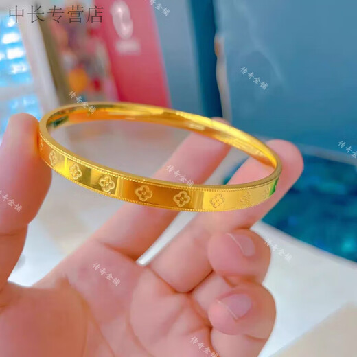 He Jiagong Lao Phoenix 999 gold solid gold four-leaf clover bracelet solid glossy bracelet gold-wrapped silver bracelet for my wife's birthday rice-shaped bracelet same style 56