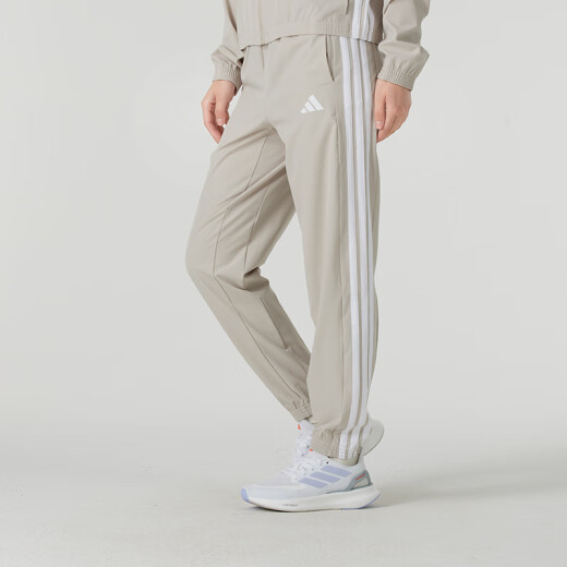 阿迪达斯（adidas）运动套装女装 2025春新款户外健身梭织立领夹克外套快干束脚长裤 浅卡其/JE6173+JD6522 M