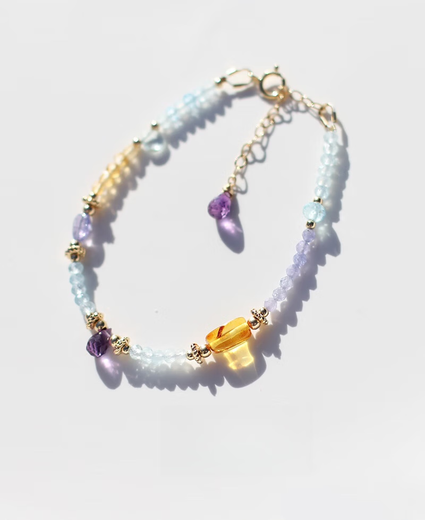 Pop's original design natural amethyst, tanzanite, aquamarine, gold and amber, American 14K gold-filled beaded fortune bracelet, a customized bracelet