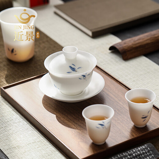 Close-up view of ice-burned orchid picture, jade porcelain Kung Fu tea set, household covered bowl, tea cup, light luxury complete tea set, ice-kind tea set (orchid picture)