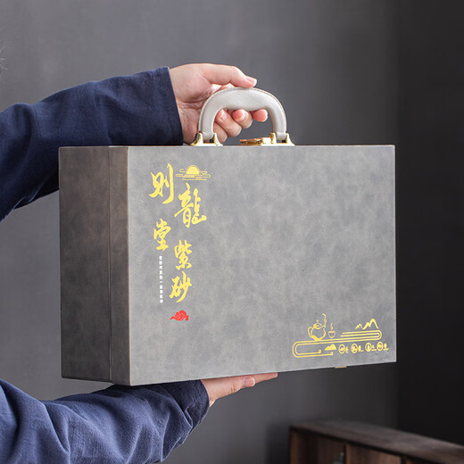 Jiangmingtang high-end purple sand embossed kung fu tea set set for gift giving to elders, leaders, customers, promotions, retirement and housewarming for colleagues, purple sand set-gift box style