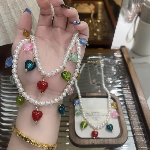 识恩679新款彩色流苏爱心吊坠项链女质感珍珠串珠项链锁骨链毛衣链49