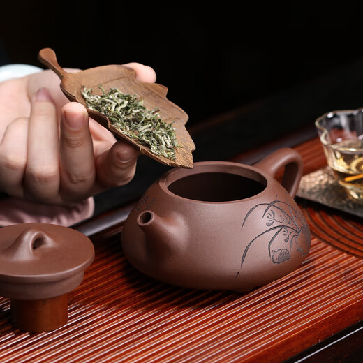 Zanghu Tianxia Yixing purple sand pot purely hand-engraved teapot stone ladle pot household kung fu teapot tea set orchid stone ladle pot orchid stone ladle (single pot) 210ml