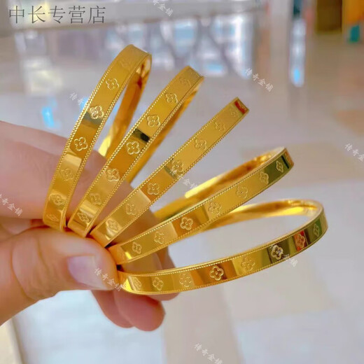 He Jiagong Lao Phoenix 999 gold solid gold four-leaf clover bracelet solid glossy bracelet gold-wrapped silver bracelet for my wife's birthday rice-shaped bracelet same style 56