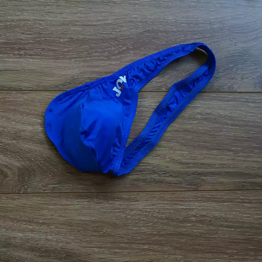 Tian Miaomiao men's low-waist sexy underwear thong cremaster personality convex one-line pants single-sided pants for men red X