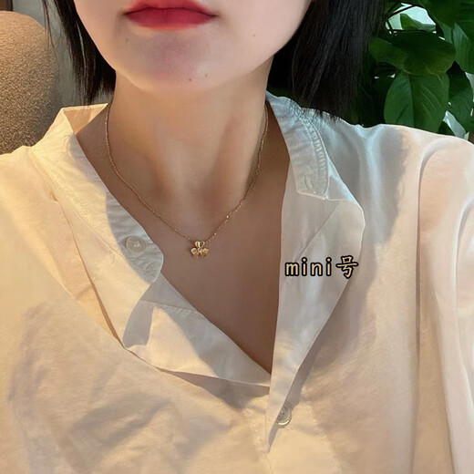 CAOX new light luxury clover necklace full of diamond petals plated 18K gold flower single diamond clavicle chain clover pendant for women