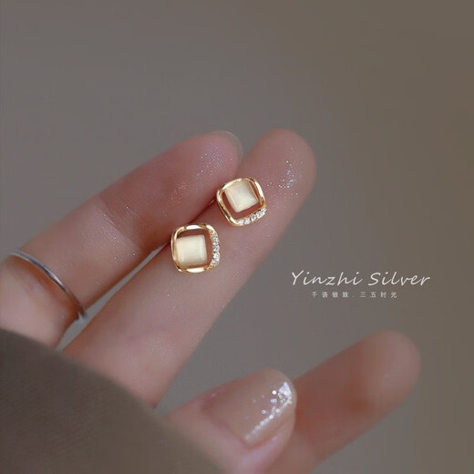 YKINCASL Old Phoenix 9999 sterling silver four-leaf clover temperament earrings for women cat's eye stone women's 2025 new earrings earrings cat's eye four-leaf clover earrings silver needle Lao Fengxiang's same style