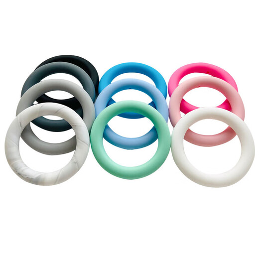 Silicone teether food-grade hole-shaped circle ring bite gum for babies during the oral period to prevent falling off and bite, light pink