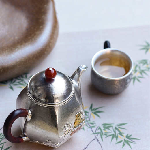 Yuyue Longmen teapot pure silver 999 sterling silver teapot hand-embossed Kung Fu tea set Dali snowflake silver