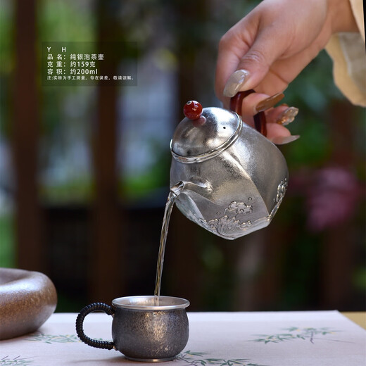 Yuyue Longmen teapot pure silver 999 sterling silver teapot hand-embossed Kung Fu tea set Dali snowflake silver