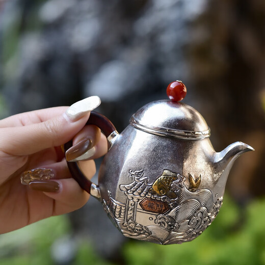 Yuyue Longmen teapot pure silver 999 sterling silver teapot hand-embossed Kung Fu tea set Dali snowflake silver