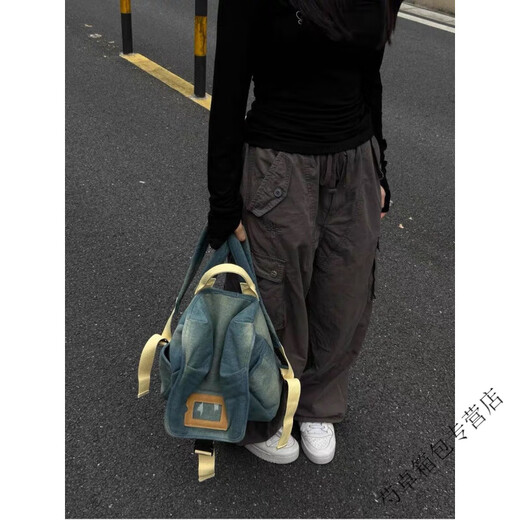 Ye Yubian bag, homemade fashionable washed contrast denim hand-held backpack, simple casual large-capacity backpack, denim color