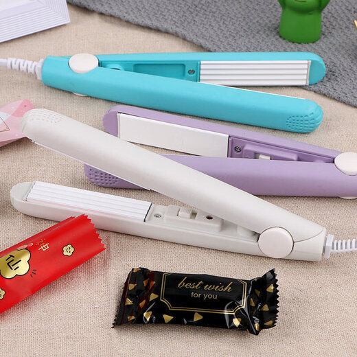 He Jiagong hand-pressed plastic sealing machine splint electric sealer small household nougat snowflake pastry packaging bag sealing purple_wave style