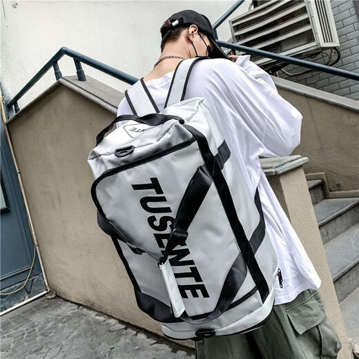 赟娅户外轻便背囊运动登山包大容量徒步防泼水爬山旅行背包双肩包男女 黑色【70L大容量 可登机】