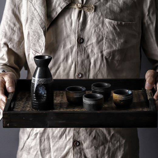 Porcelain in the Four Directions Japanese retro old tavern sake set home wine pot soju cup restaurant small wine glass liquor dispenser Japanese and Korean restaurant specialty wine set Hengdian pose Chinese style trumpet sake set one pot and two cups