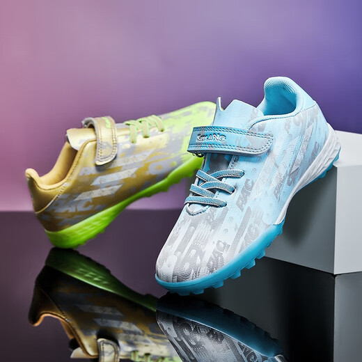 FEELACES儿童足球鞋碎钉男女专用猎鹰梅西学生训练鞋儿童tf人造草地球鞋 6195鸳鸯金月碎钉 31【球袜+球包+护板】