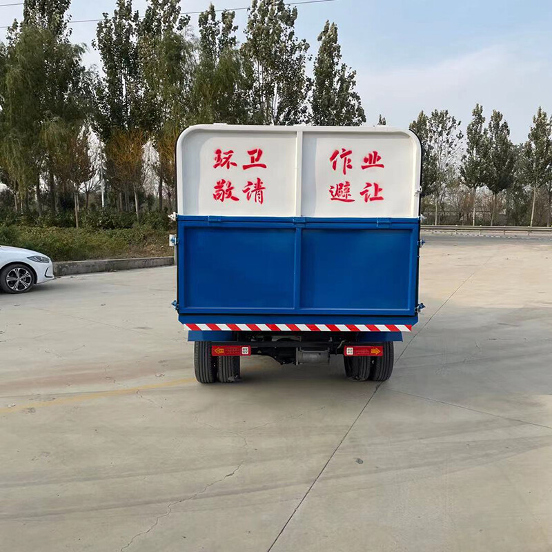 Electric four-wheel hanging bucket garbage truck side-loading dumpster top-loading garbage transfer truck 6 square meters rural sanitation small new energy garbage truck sanitation truck manufacturer electric four-wheel garbage truck