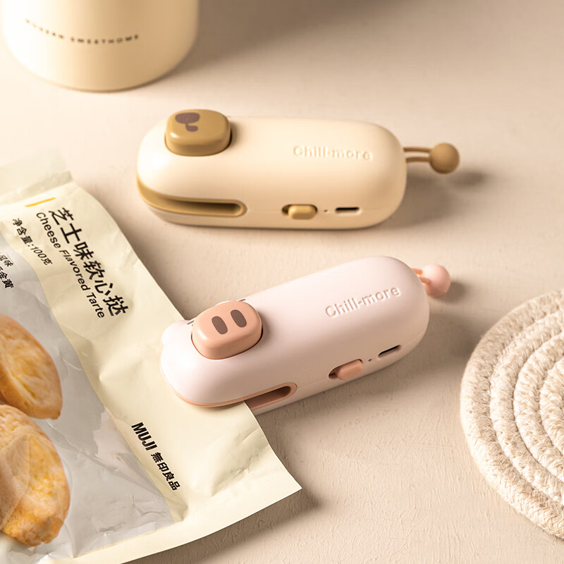 Modern housewife sealing machine mini small household snacks fresh sealing portable plastic sealing machine food sealing artifact USB rechargeable pink pig sealing machine