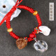 Fuguang Puzhao baby fetal hair pendant peach wood bracelet peach basket souvenir storage bottle children newborn pig bone bracelet birth year red rope pink D424N2