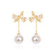 Qlady bow tassel earrings, feminine and high-end, 2025 new imitation pearl earrings, light luxury earrings gift