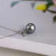 Guran Zhenyu 18K gold perfect round Tahitian black pearl pendant 10.7mm seawater pearl necklace pendant