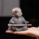 Jiuzao's creative purple sand tea pet little monk ornaments can cultivate the Zen spirit of the little novice monks tea ceremony tea play tea art tea room table decoration black gold sand-Dapeng spreads wings/CYY